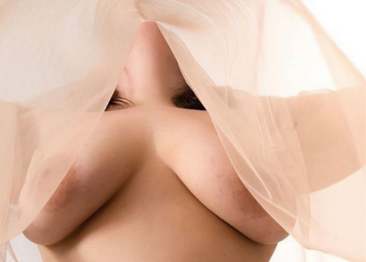 How to Support Your Local Sex Worker - Topless Nude Model Draped in Beige Cloth