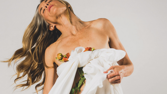 Common Menopause Myths - Mature Model in White Sheet