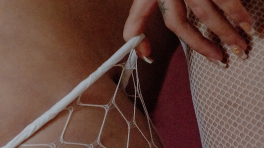 THink Kink: 8 Thinks to keep in mind before diving into the world of BDSM - closeup of fingers pulling on white fishnet tights white lace gloves. 