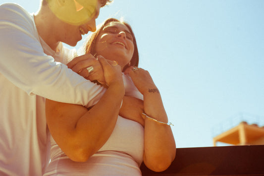 Abortion Rights Are Human Rights - Couple Holding Each Other in the Sunlight