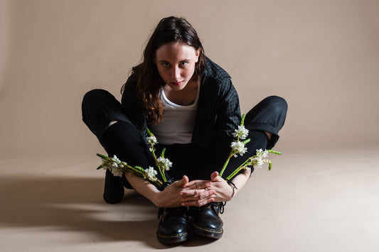  Transgender Awareness Week - Z the Bug Sitting while Holding White Flowers