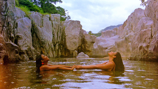 Safe & Sustainable Sexual Self Care - Two Models in Swimsuits in the Ocean