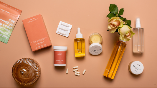 All Natural Ingredients Blog - flat lay of all Momotaro Apotheca on a beige background