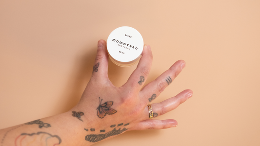An Ode to Salve - Close up of hands opening a jar of Salve 