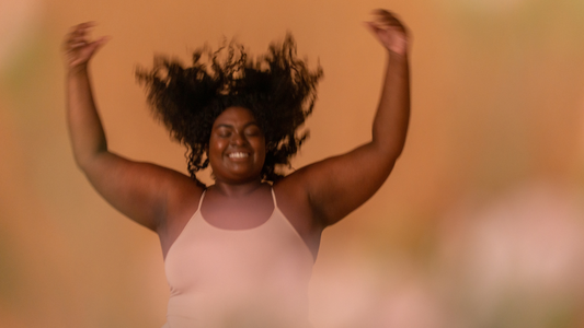 Why do I get Yeast Infections During Summer? - Gabby mid jump with hair in the air