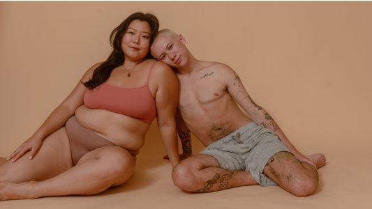 Alternative Family Planning - Two models posing with each other on the ground