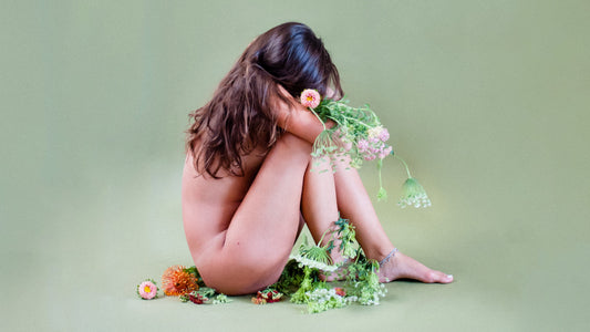 Resources for LGBTQIA Youth and Allies in Florida - Nude Models Curled Up on the Floor Surrounded by Flowers