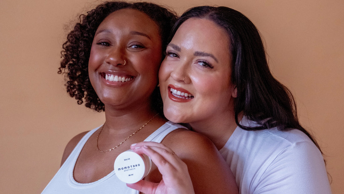 Megan and Portia hold the Momotaro Apotheca Salve for vulva and vaginal health