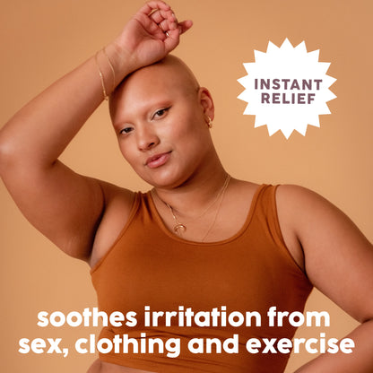 Woman with hand against head. Instant relief from irritation.