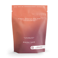 Momotaro Apotheca organic botanical bath soak packaging on a white background