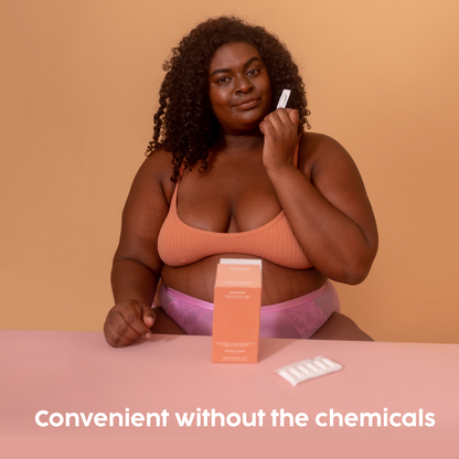 Woman holding Momotaro Apotheca's Suppository - Convenient without the chemicals.